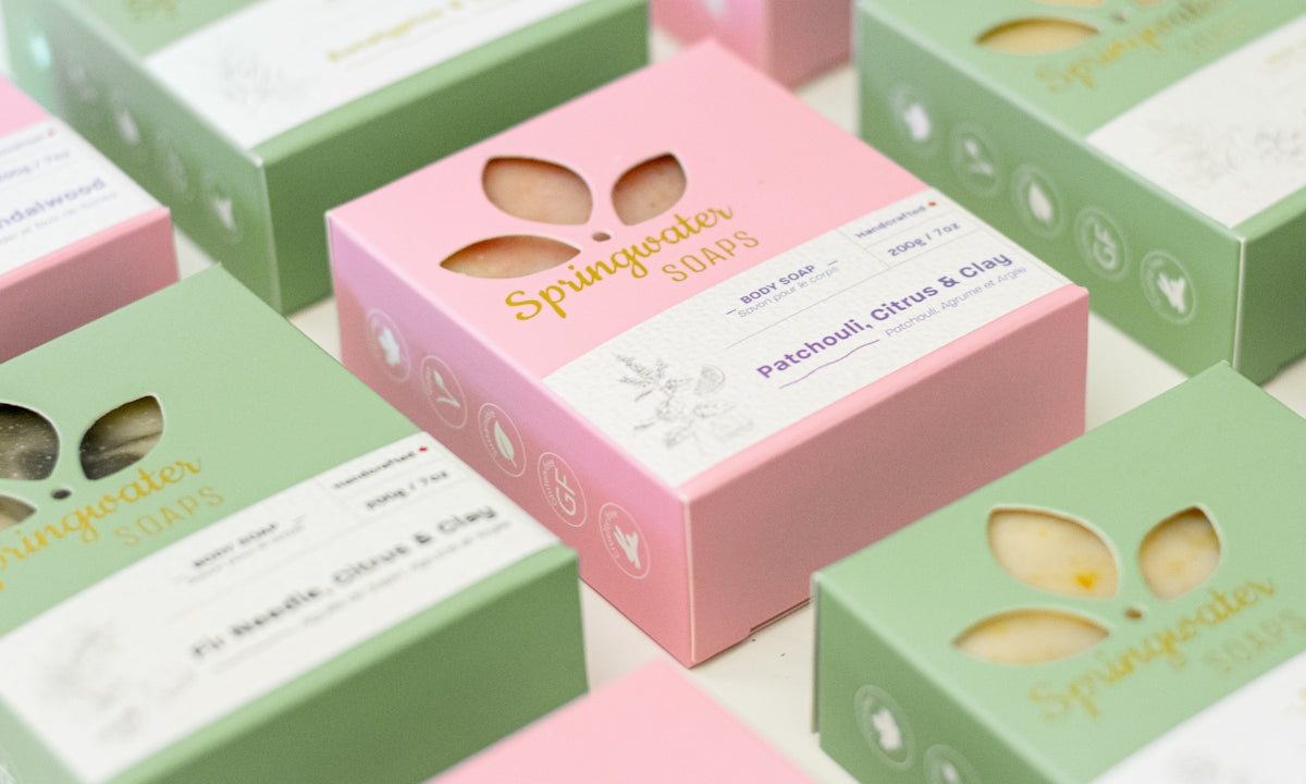 green and pink cardboard boxes