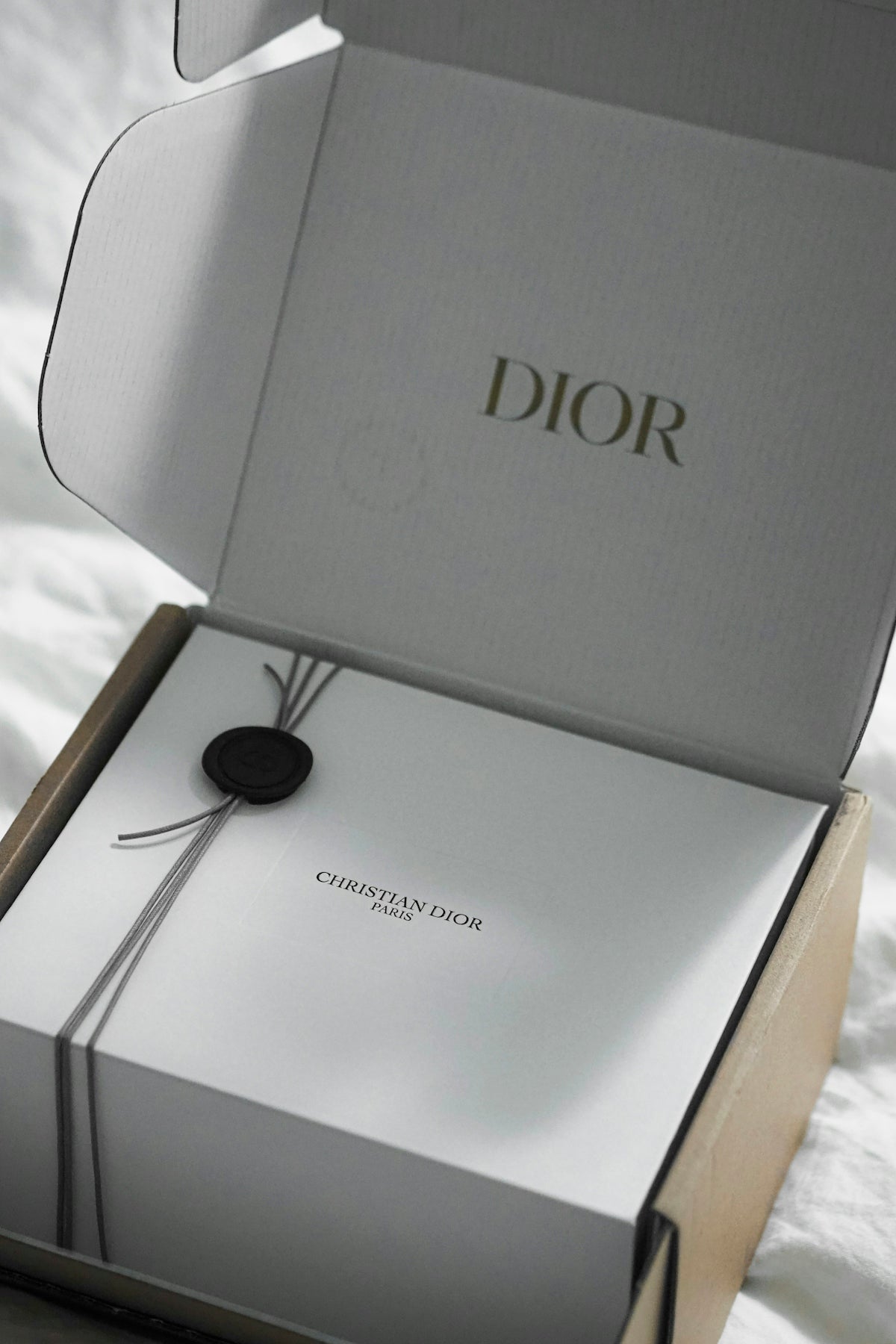 Dior gift box with ribbon and seal