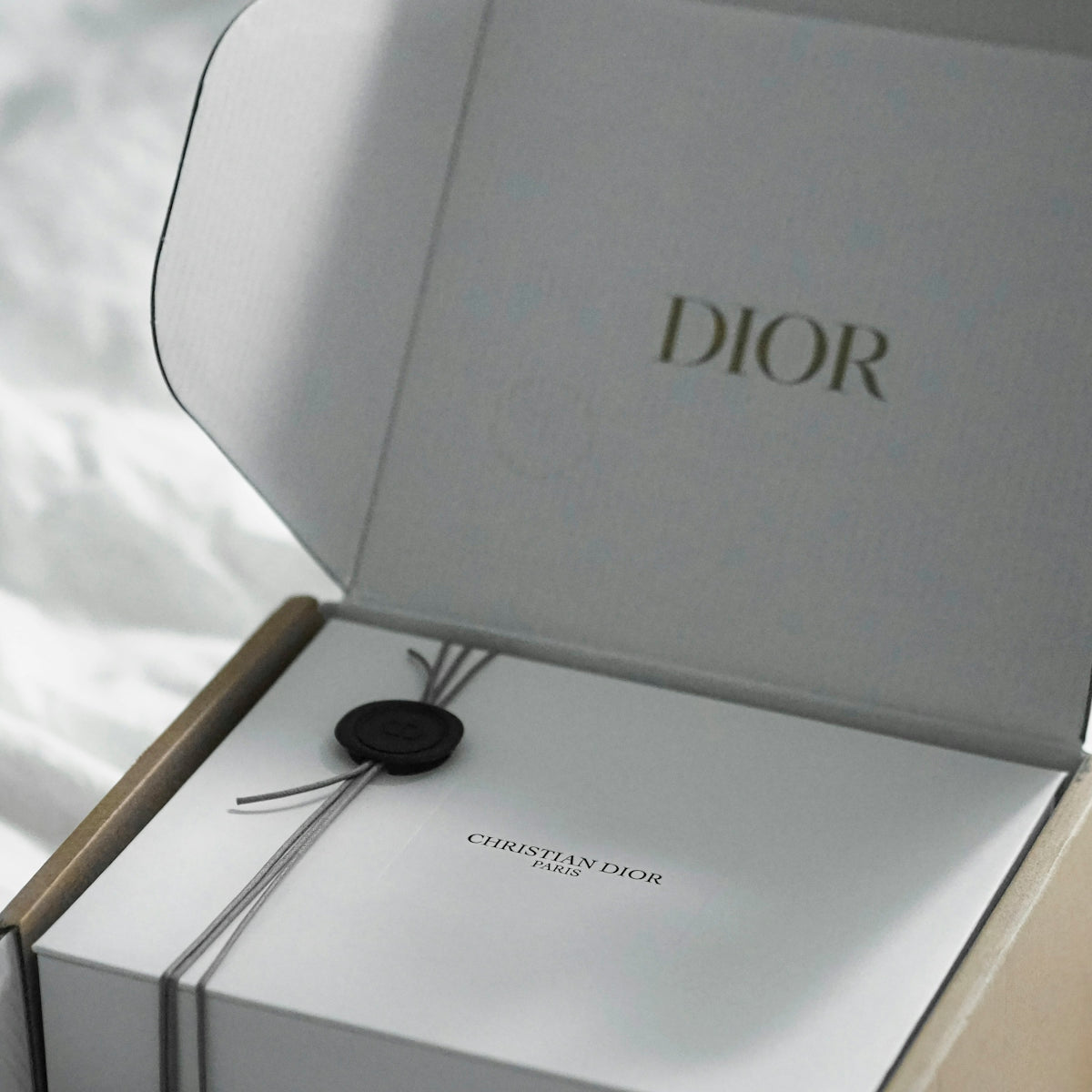 Dior box with ribbon and seal