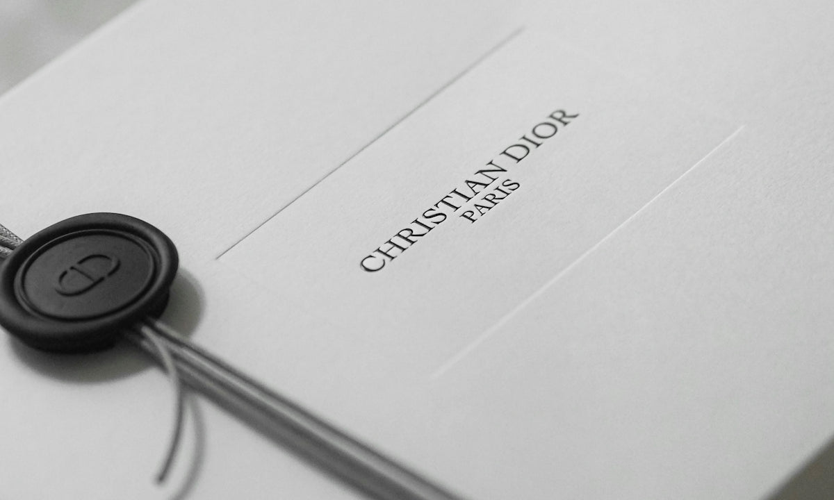 White christian dior gift box with ribbon and seal