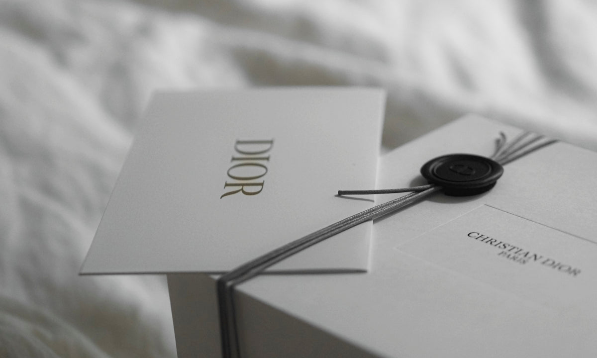 Dior gift box with wax seal and ribbon