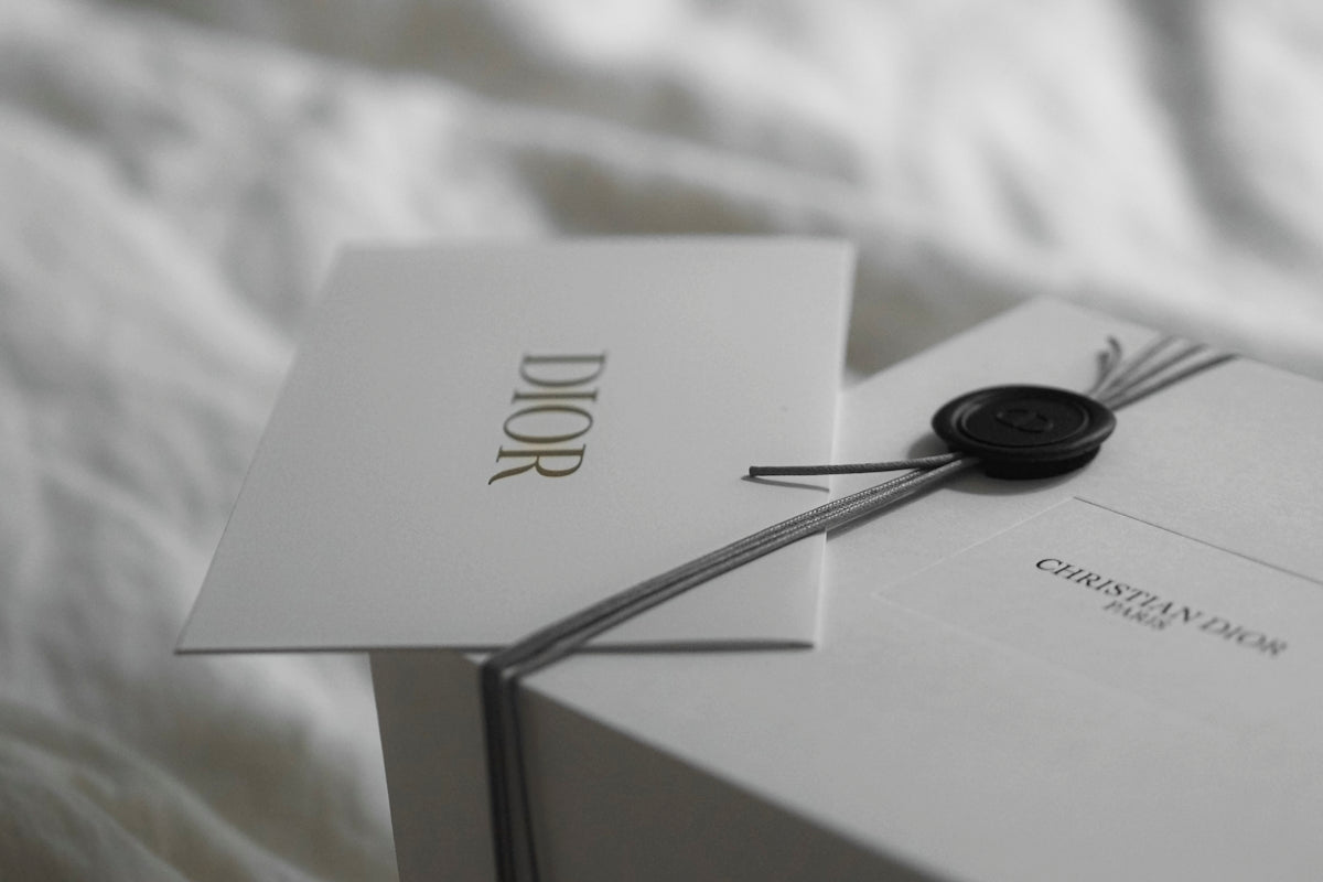 Dior gift box with wax seal and ribbon